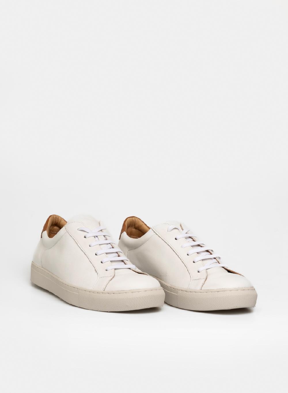 Etiqueta negra Zapatilla urbana vaqueta Tienda de fábrica