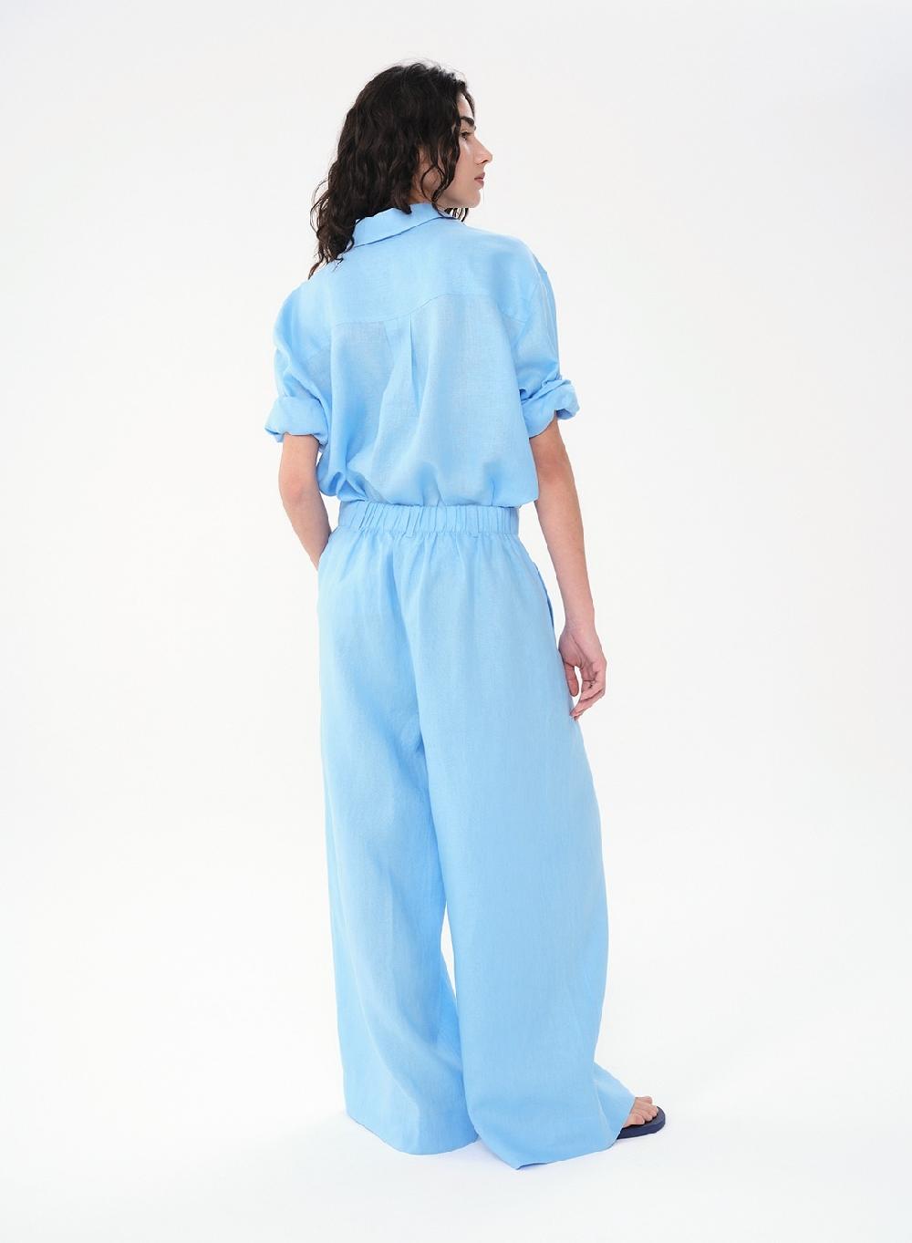 Etiqueta negra Pantalon Pinzas Lino Ahorra y exporta