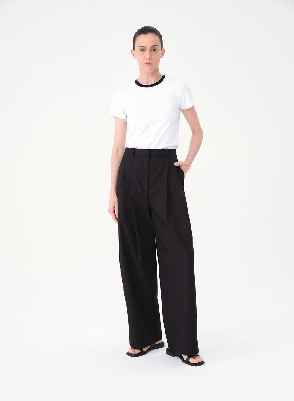 Etiqueta negra Remera rib combinada Última moda