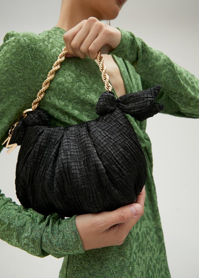 lola casademunt Mini bolso satinado con lazos laterales Precio ultrabajo