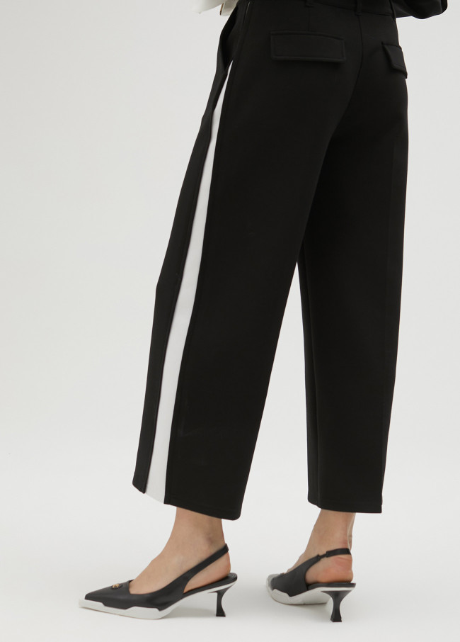 lola casademunt Pantalón negro y blanco en lateral Libre de impuestos
