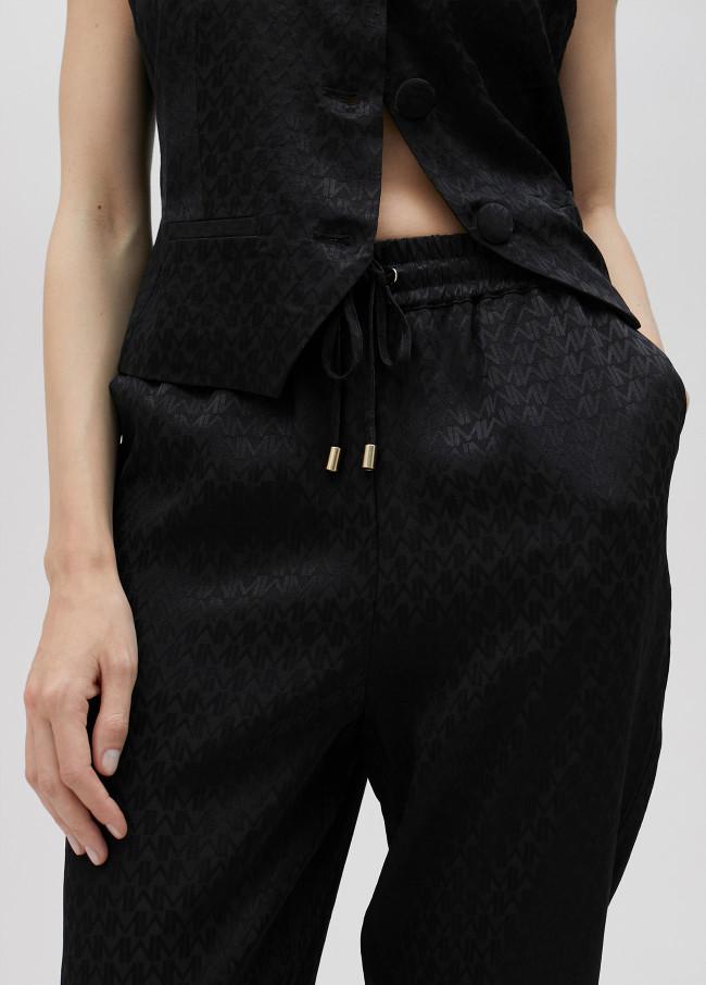 lola casademunt Pantalón jogger logotipado Devoluciones gratuitas