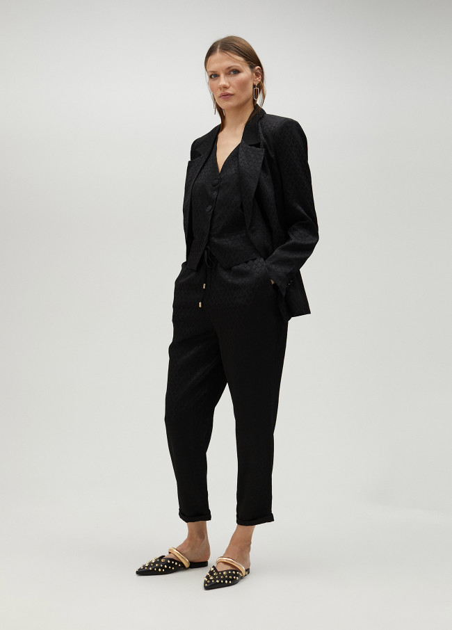 lola casademunt Pantalón jogger logotipado Devoluciones gratuitas