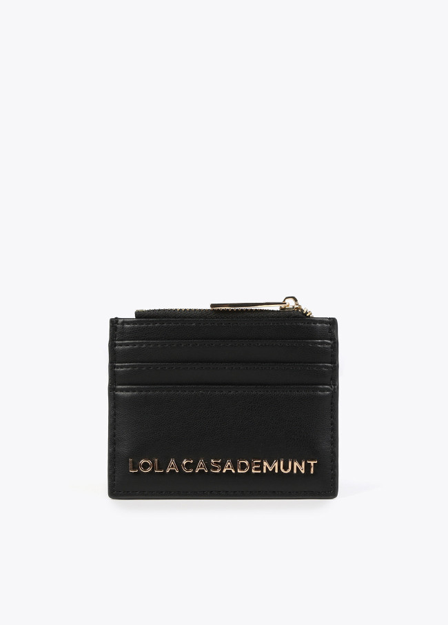 lola casademunt Monedero negro y dorado Limitado a 3 días