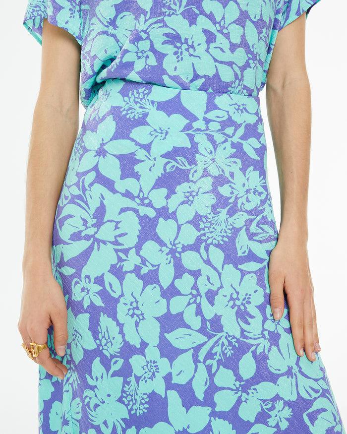 system action Falda midi estampado floral grande Devoluciones gratuitas