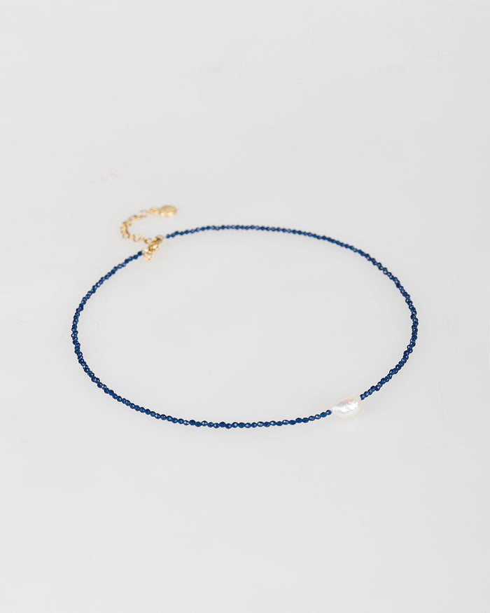 system action Collar azul con perla blanca Rebajas de fábrica