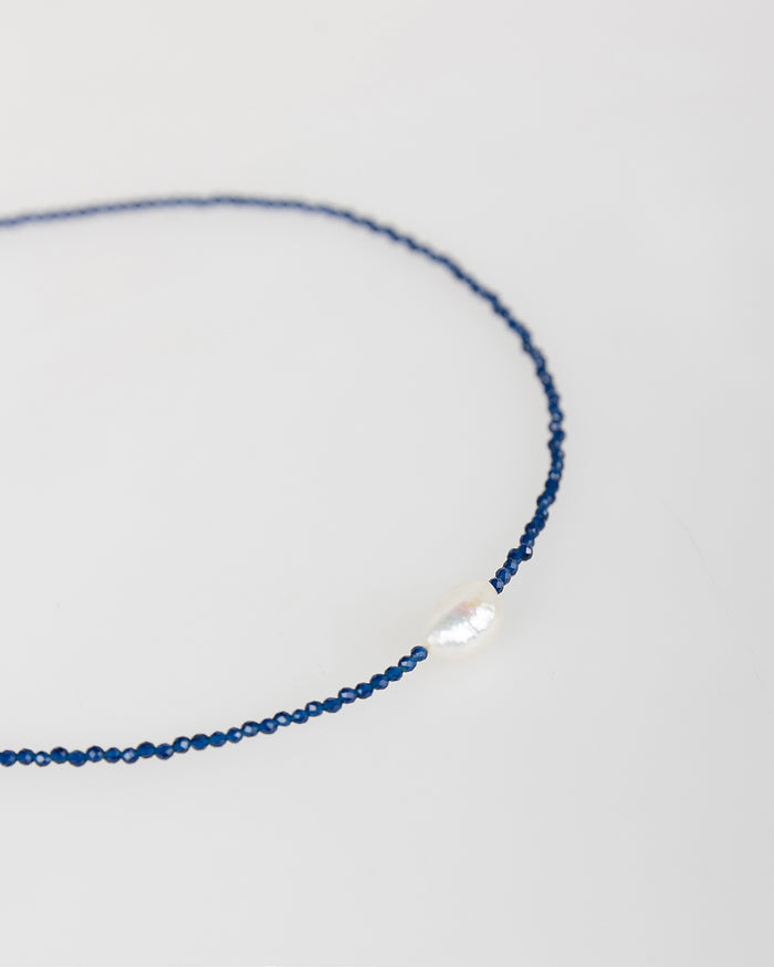 system action Collar azul con perla blanca Rebajas de fábrica