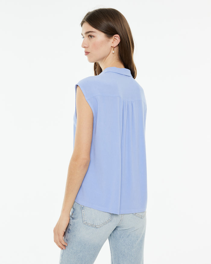 system action Camisa fluida oversize sin mangas Los más vendidos