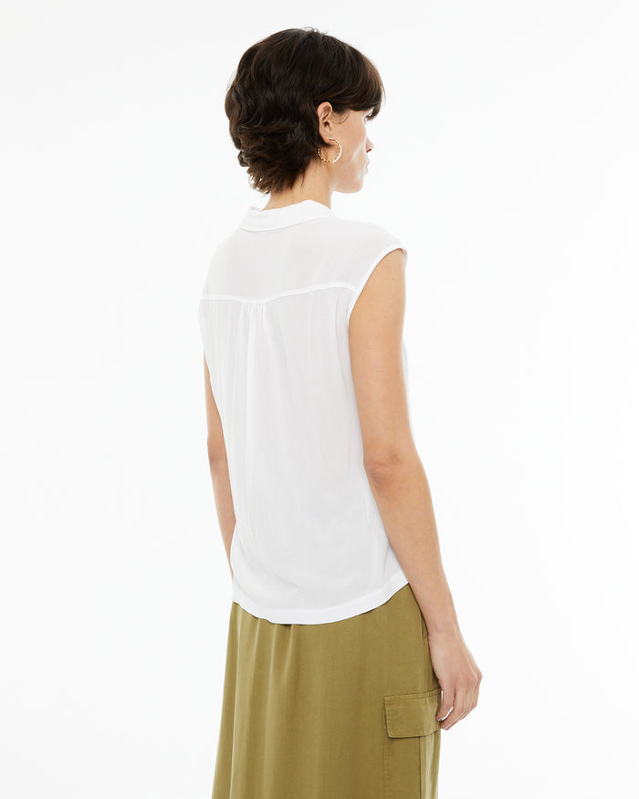 system action Camisa fluida oversize sin mangas Descuento