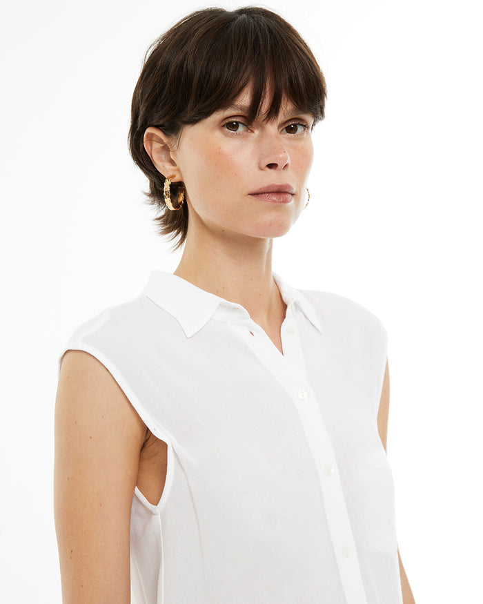 system action Camisa fluida oversize sin mangas Descuento