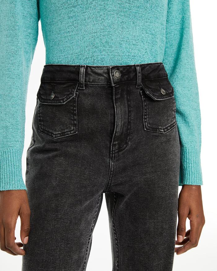 system action Jeans fit flare tiro medio detalle bolsillos delanteros Tienda