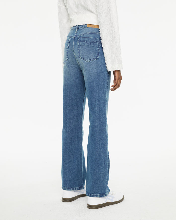 system action Jeans rectos flare fit detalle costura centro pierna Rebajas top