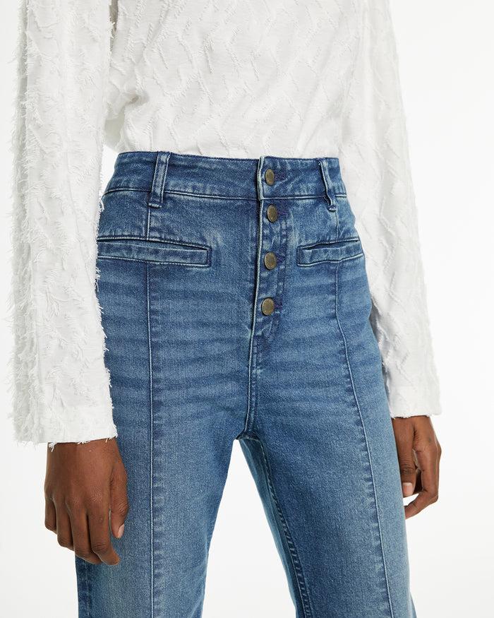 system action Jeans rectos flare fit detalle costura centro pierna Rebajas top