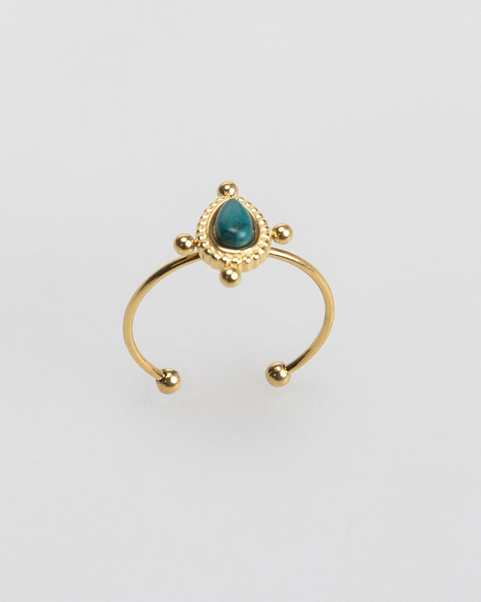 system action Anillo fino color oro piedra color