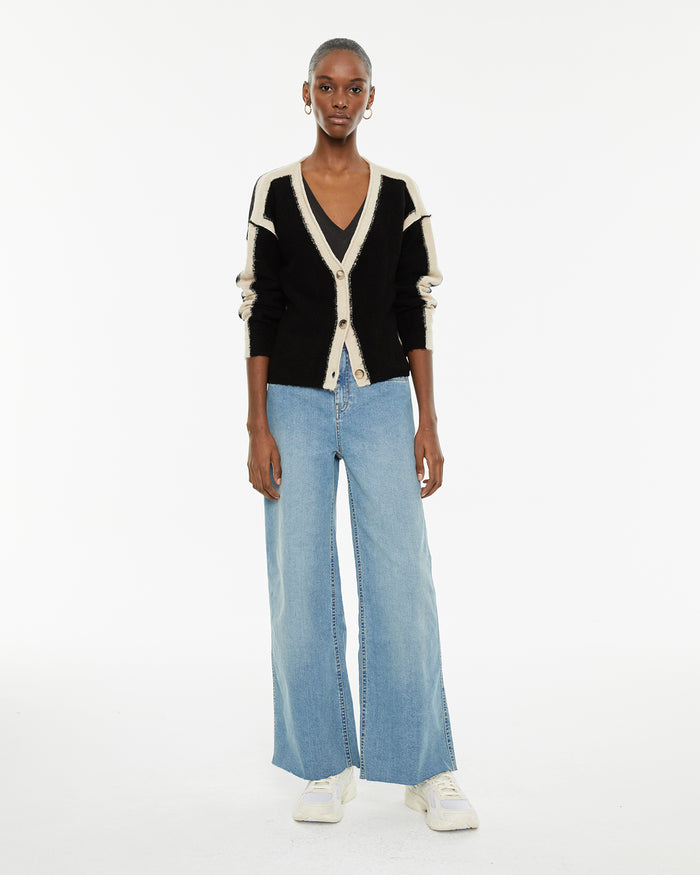 system action Pantalón vaquero wide leg tiro medio bolsillos delanteros vivo
