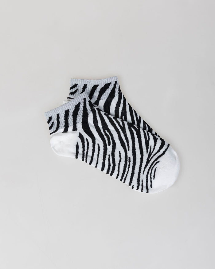 system action Calcetines animal print cebra Limitado a 3 días