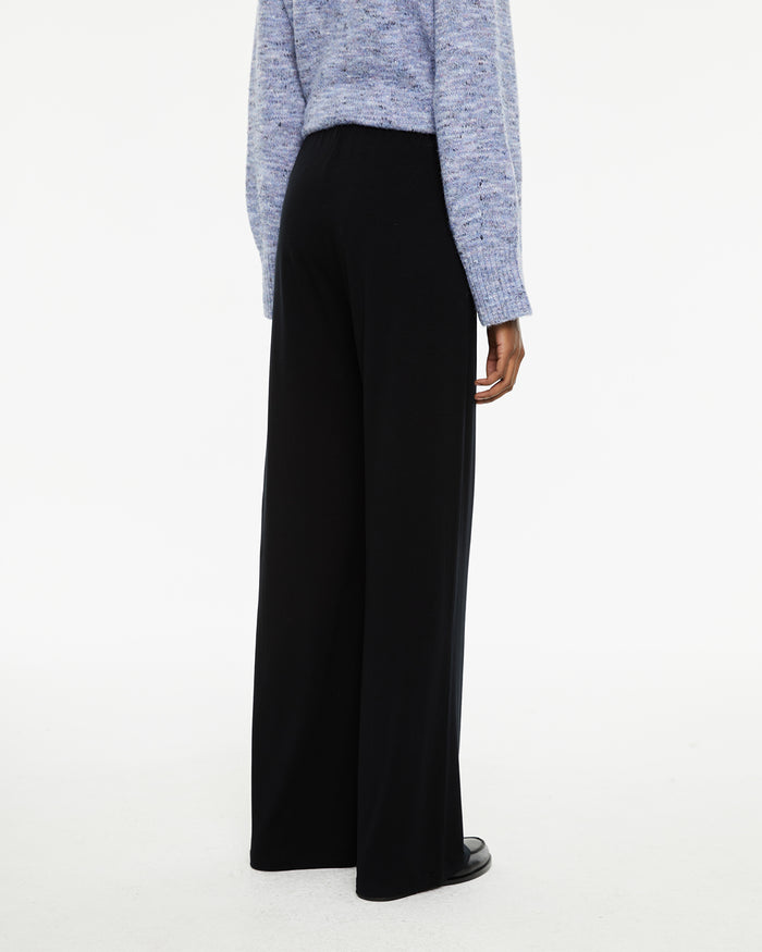 system action Pantalón básico elástico evasé con goma cinturilla Rebajas