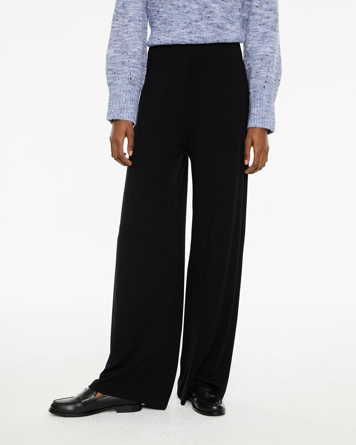 system action Pantalón básico elástico evasé con goma cinturilla Rebajas