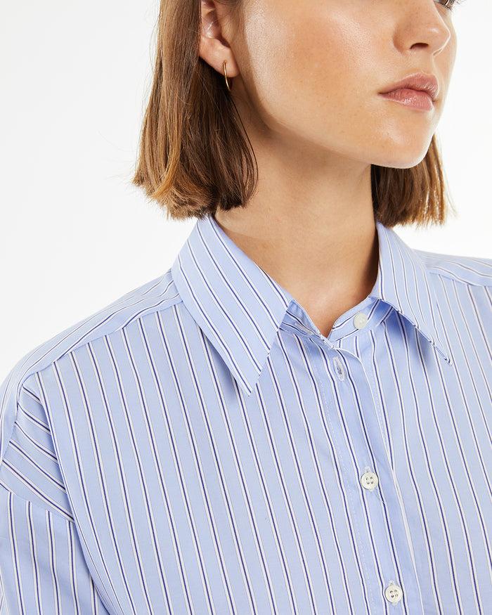 system action Camisa rayas azul con bolsillo frontal Envío gratis