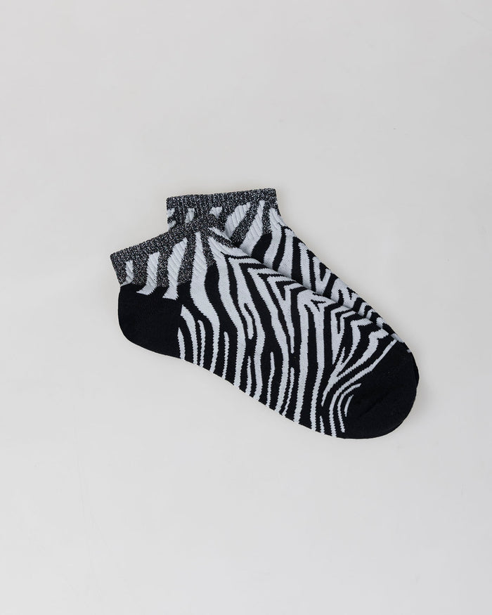 system action Calcetines animal print cebra Limitado a 3 días