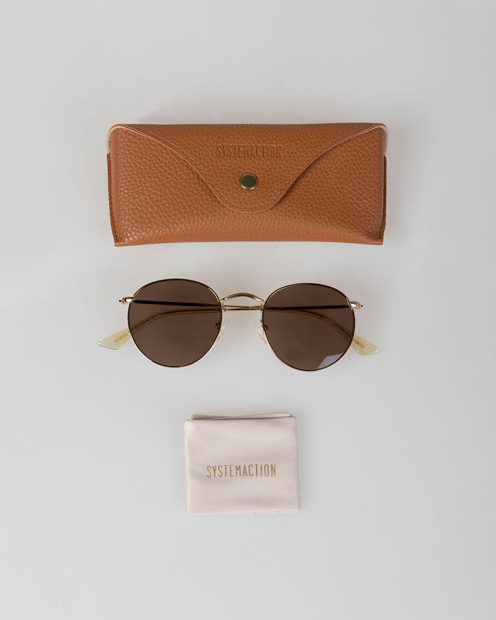 system action Gafas de sol montura color oro Última moda