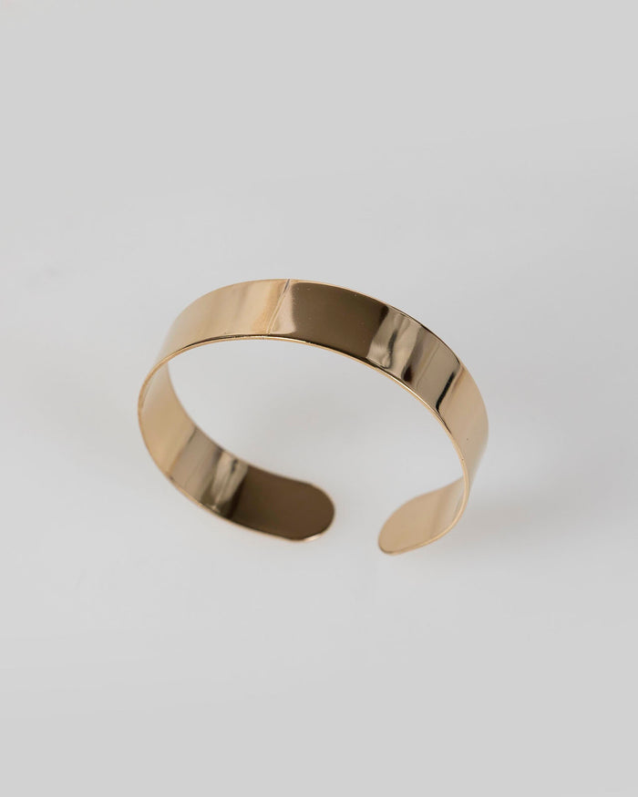 system action Brazalete rígido oro