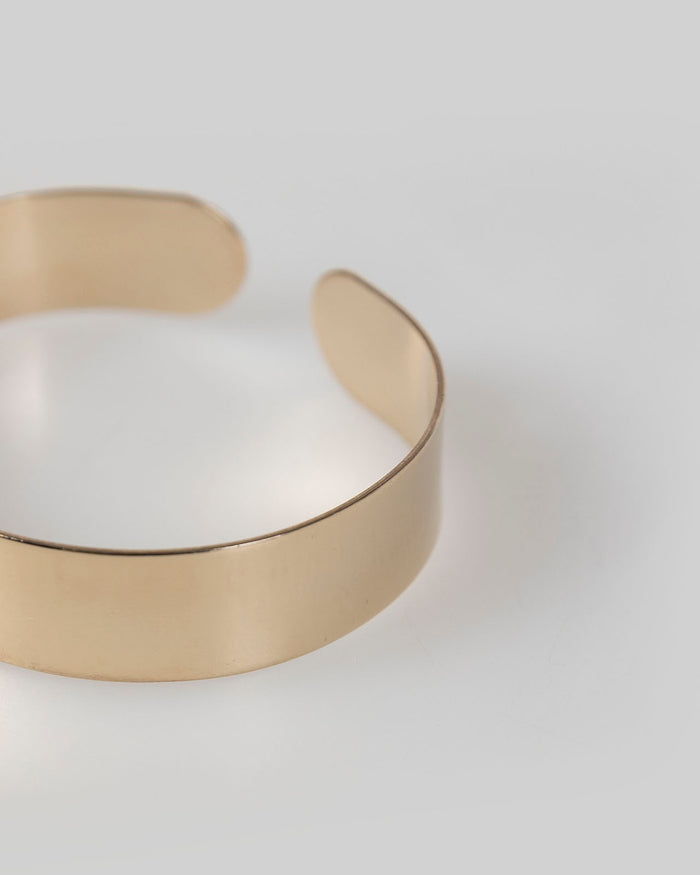 system action Brazalete rígido oro Descuento por venta flash