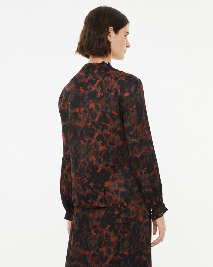 system action Camisa estampada con volante en el cuello Tienda