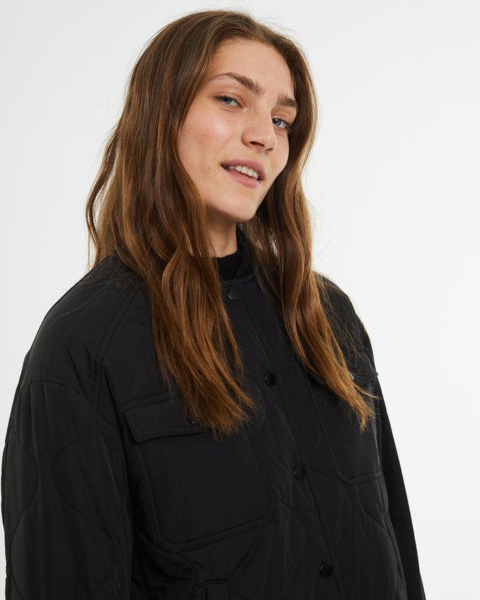 system action Anorak corto con puños y cuello rib Liquidación