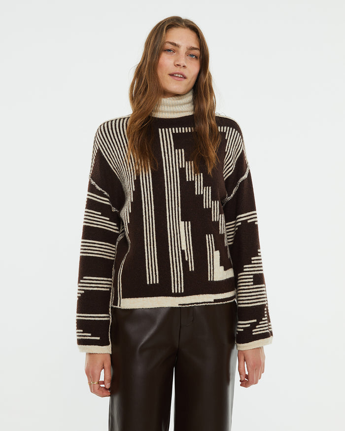 system action Jersey reversible jacquard geométrico cuello alto