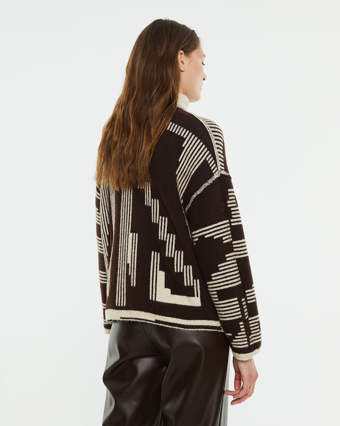 system action Jersey reversible jacquard geométrico cuello alto Último día