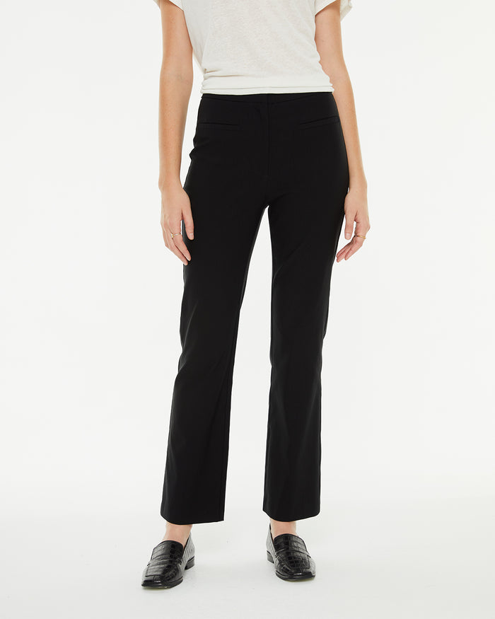 system action Pantalón elástico estilo capri flare Libre de impuestos