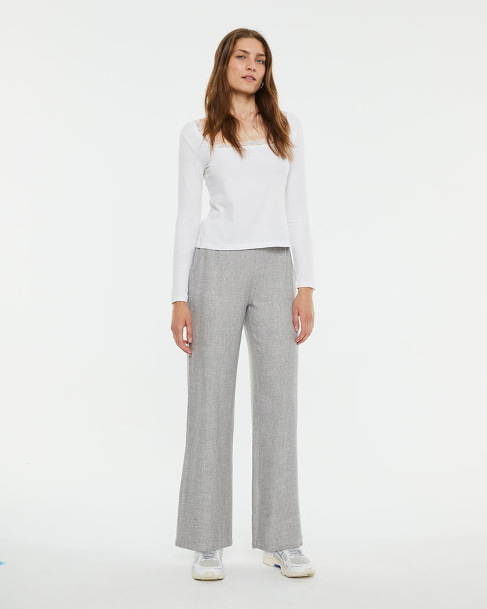 system action Pantalón largo relaxed fit pliegues en delantero