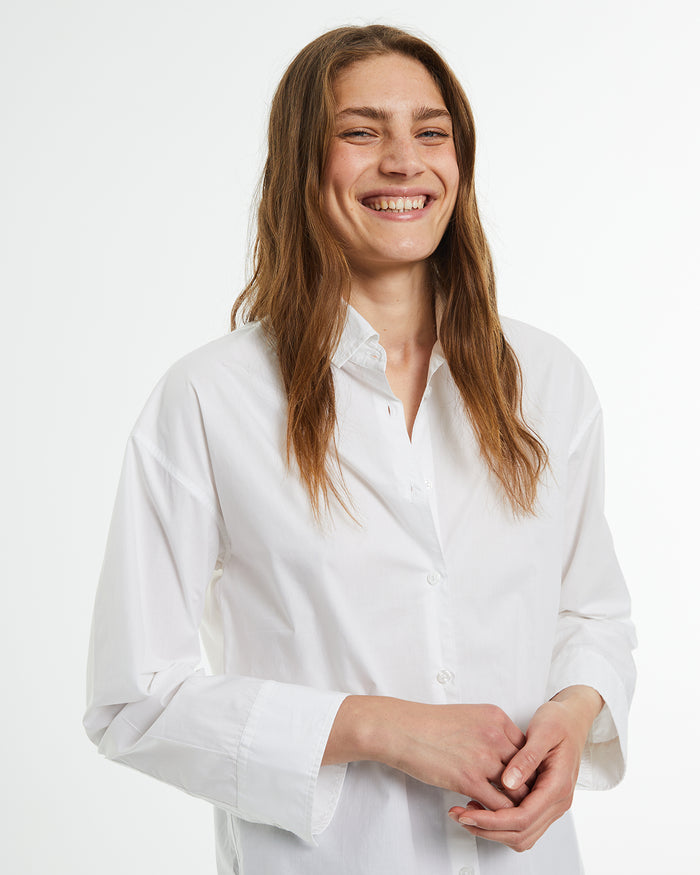 system action Camisa masculina popelín oversize Promoción trimestral