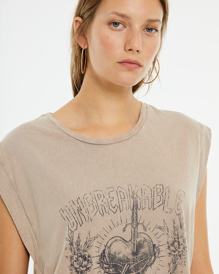system action Camiseta beige estampado corazón unbreakeable Envío internacional gratuito