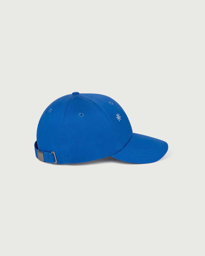 thinking mu Gorra azul solsol Chris Ahorra y exporta