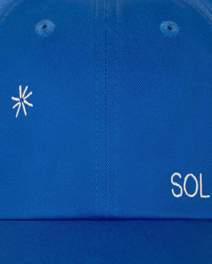 thinking mu Gorra azul solsol Chris Ahorra y exporta