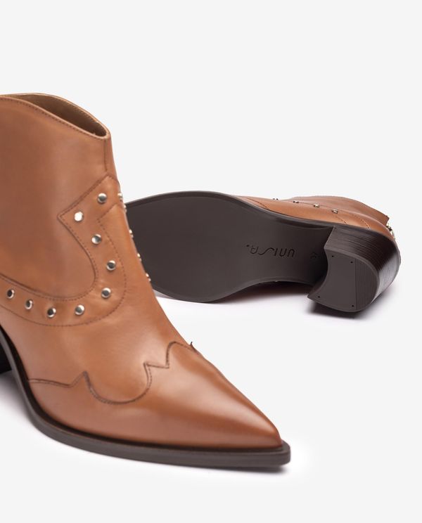unisa Botín cowboy con tachuelas Grandes ahorros
