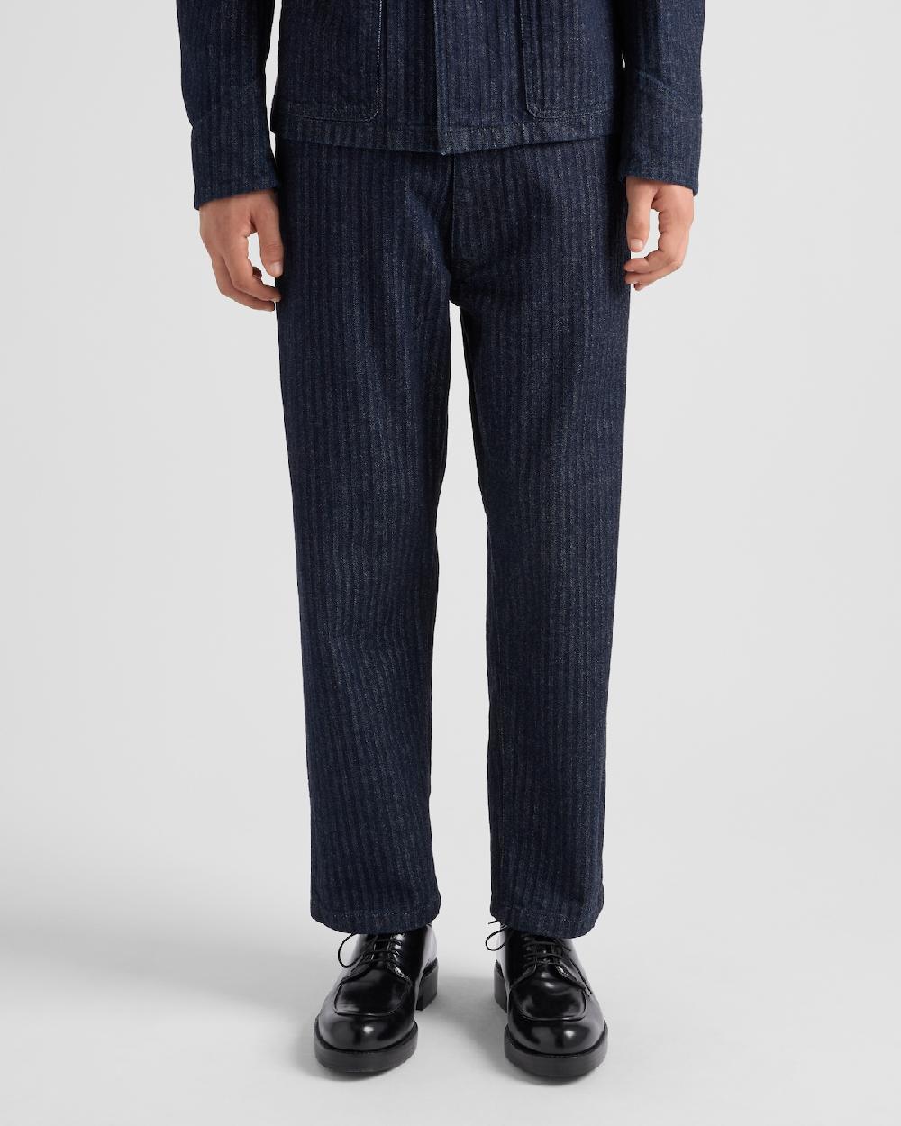 Prada Pantalones en denim de chevrón con pernera ancha Ofertas de temporada