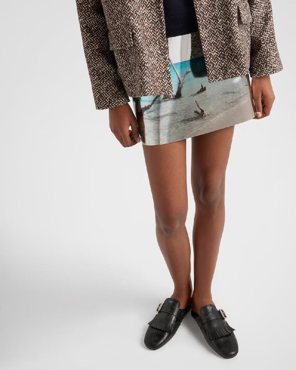Prada Mules Shuffle de piel con flecos En oferta