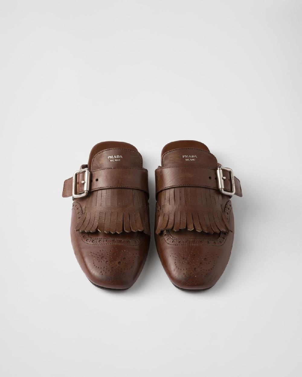 Prada Mules Shuffle de piel con flecos Libre de impuestos