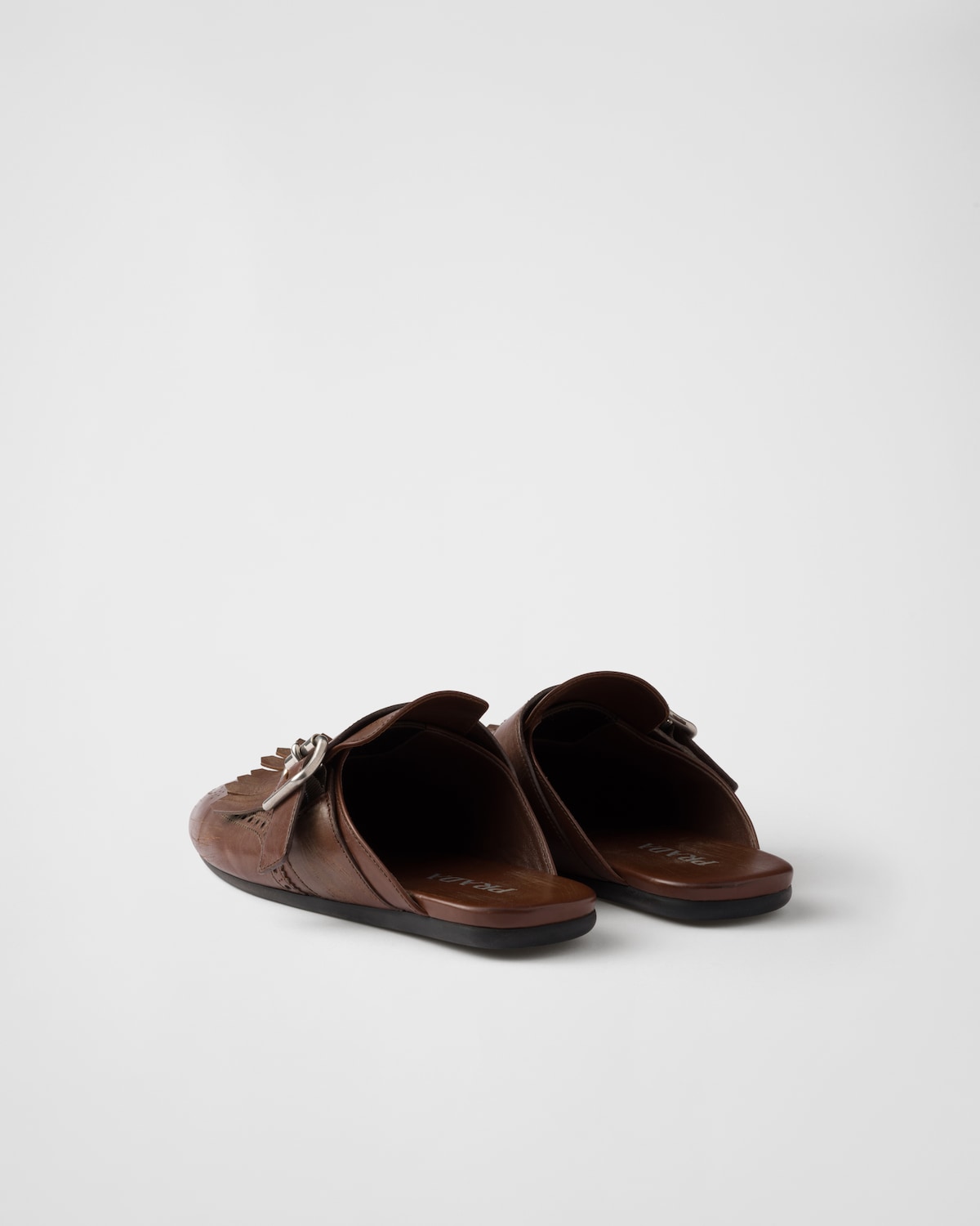 Prada Mules Shuffle de piel con flecos Libre de impuestos