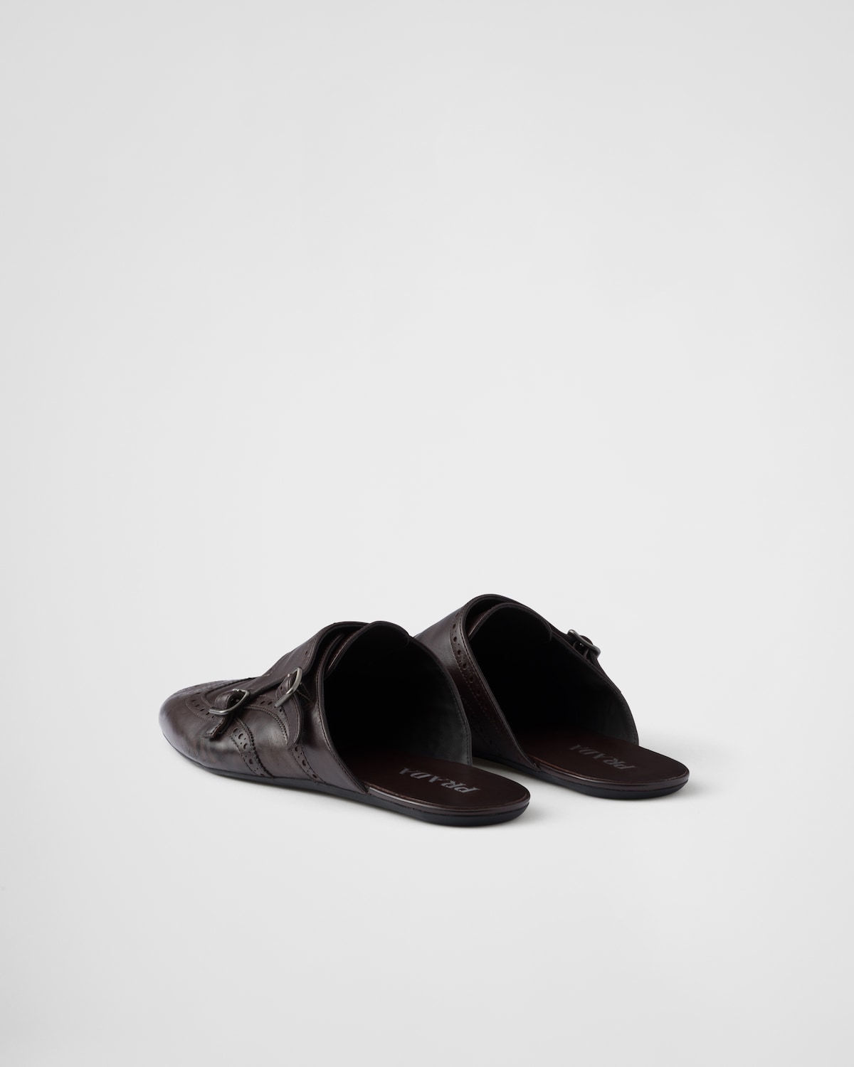 Prada Mules Shuffle de piel con doble tira de hebilla Últimos 3 días