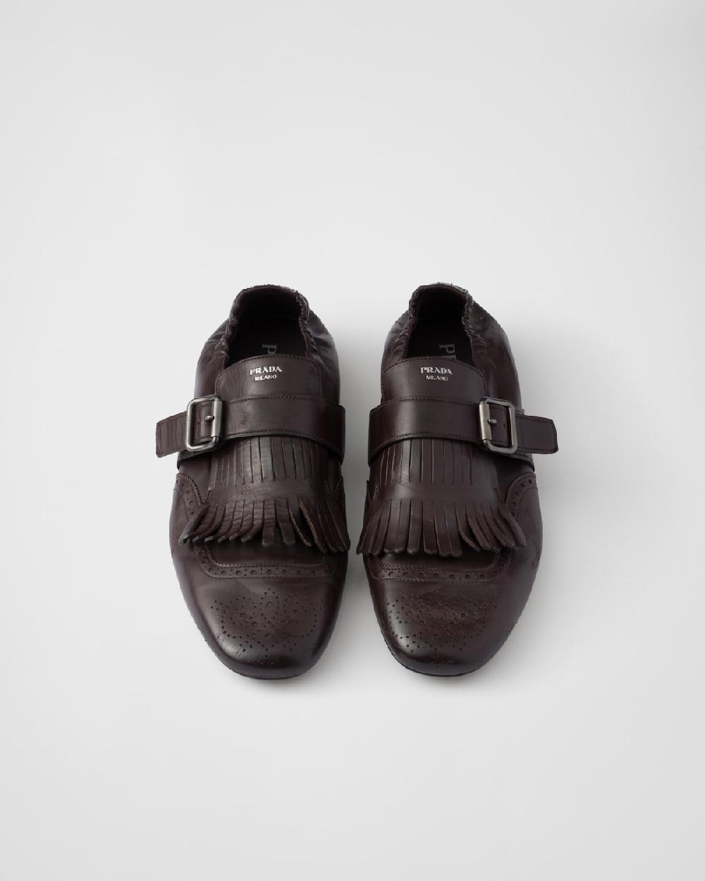 Prada Zapatos Shuffle con tira de hebilla y flecos COMPRAR AHORA