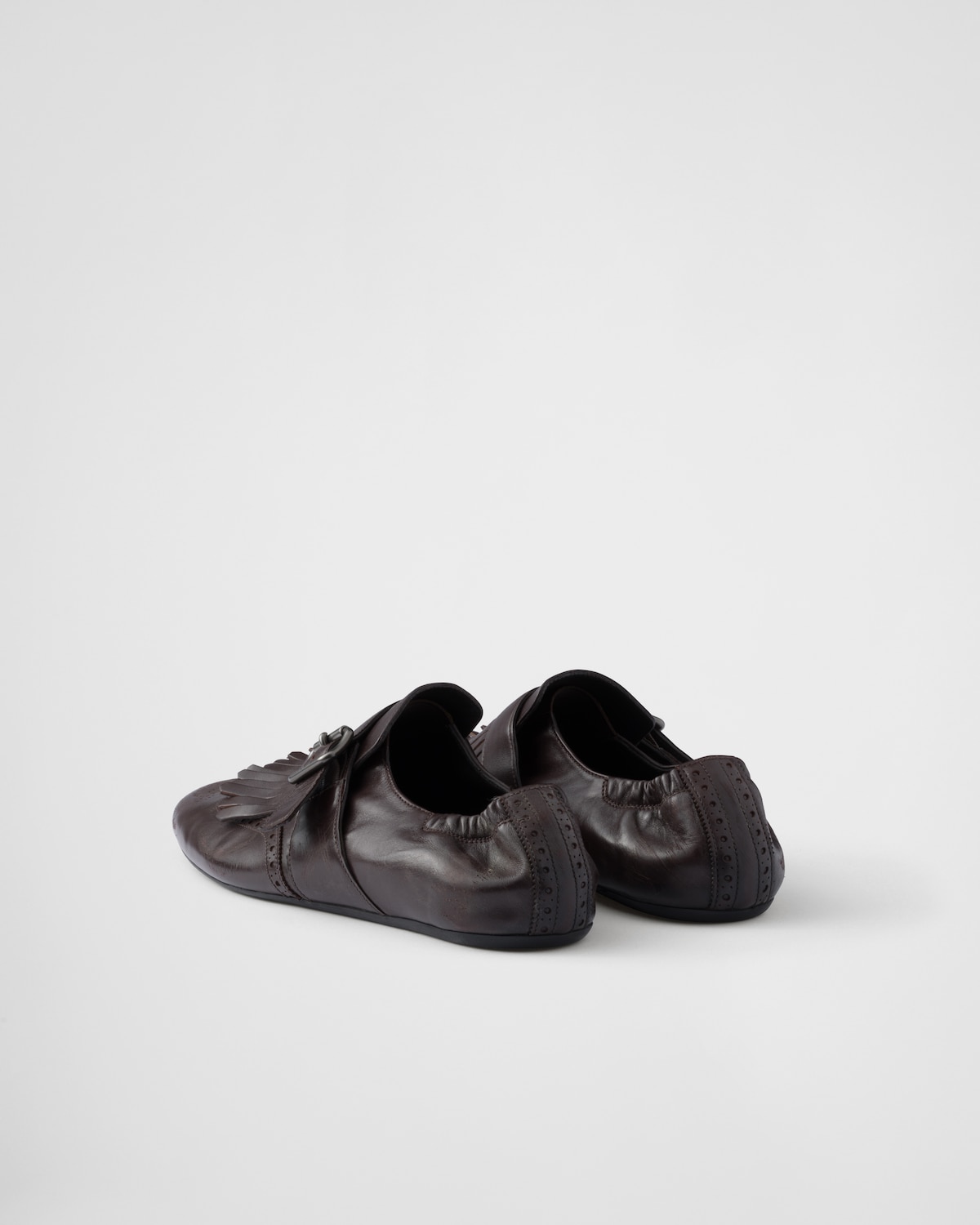 Prada Zapatos Shuffle con tira de hebilla y flecos COMPRAR AHORA