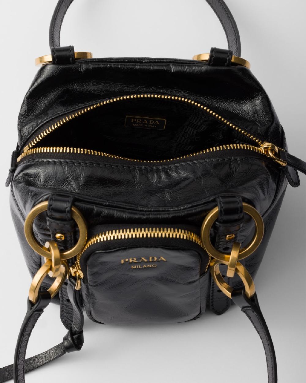 Prada Minibolso Prada Dangle de piel con asa superior Última moda