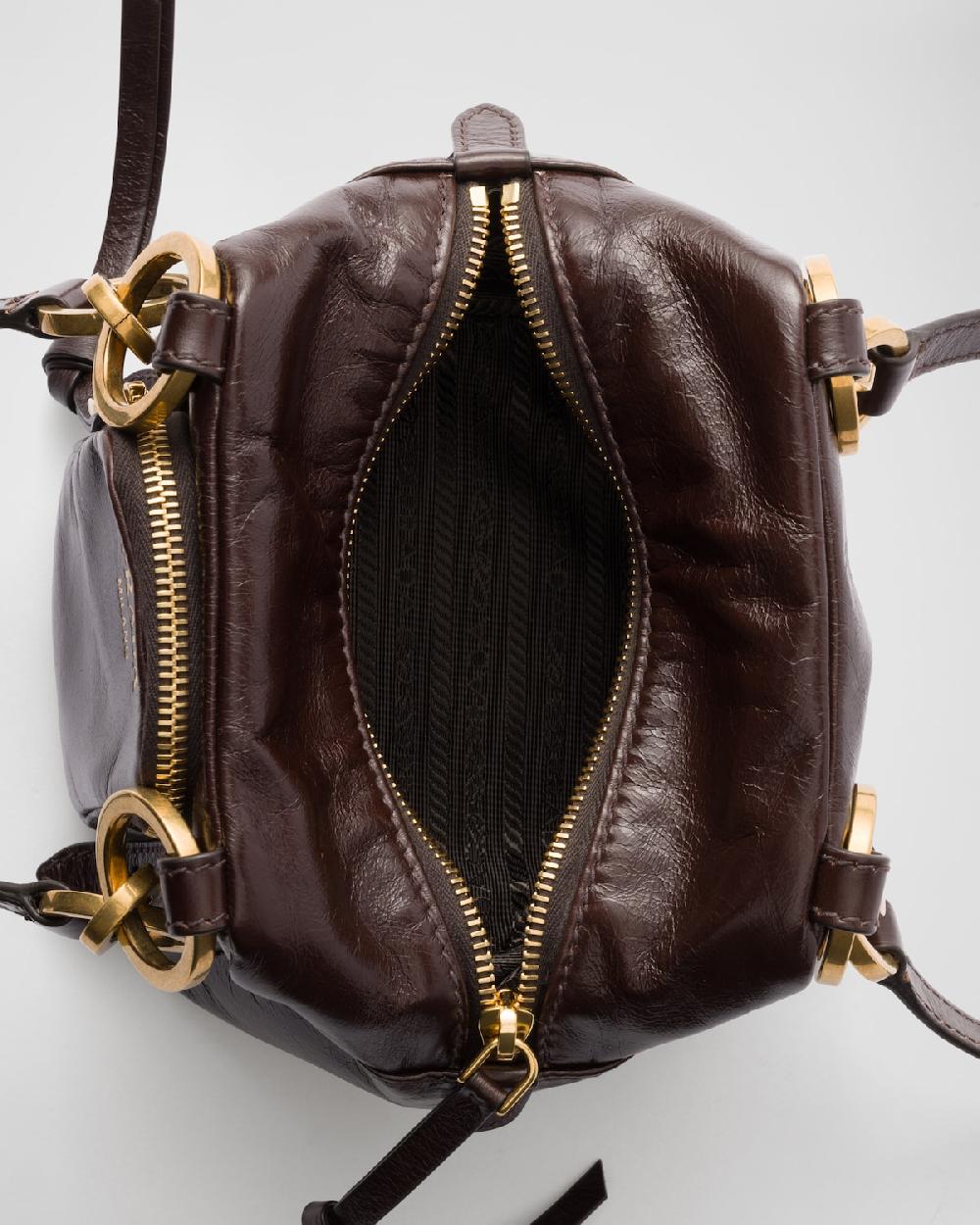 Prada Minibolso Prada Dangle de piel con asa superior Ofertas de temporada