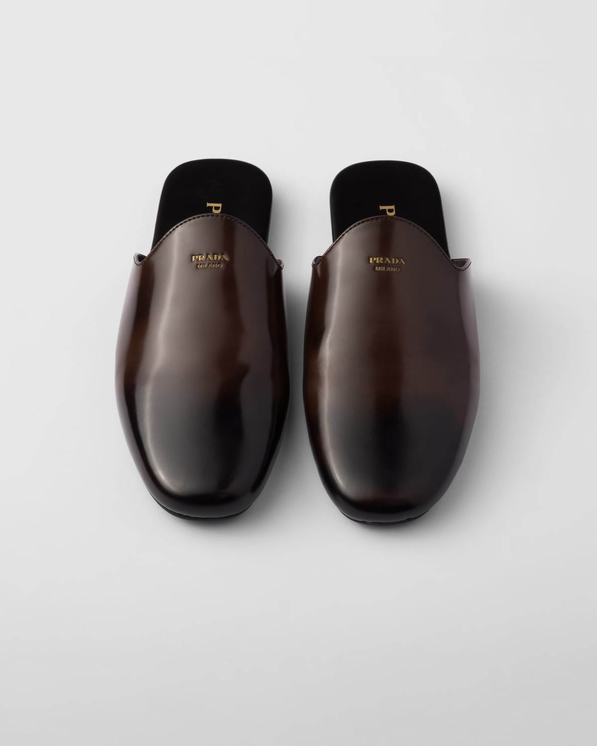 Prada Mules de piel cepillada Ofertas