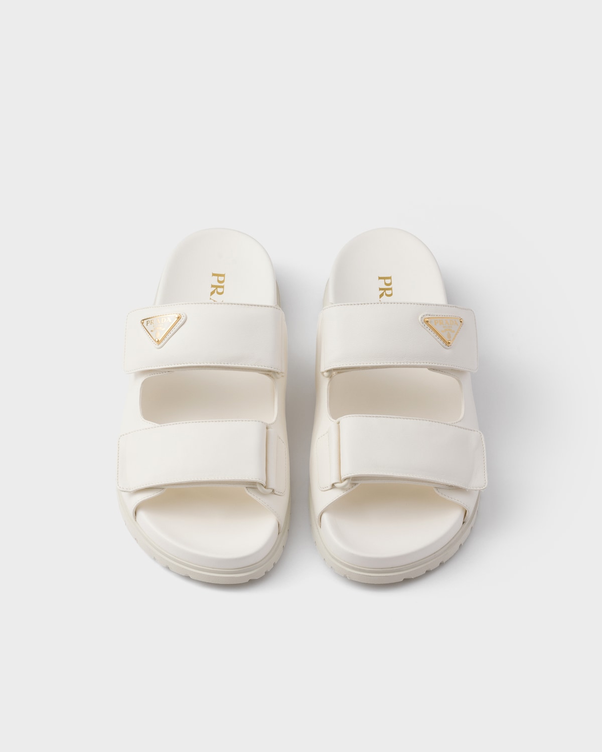 Prada Sandalias planas de piel de napa Envío gratis