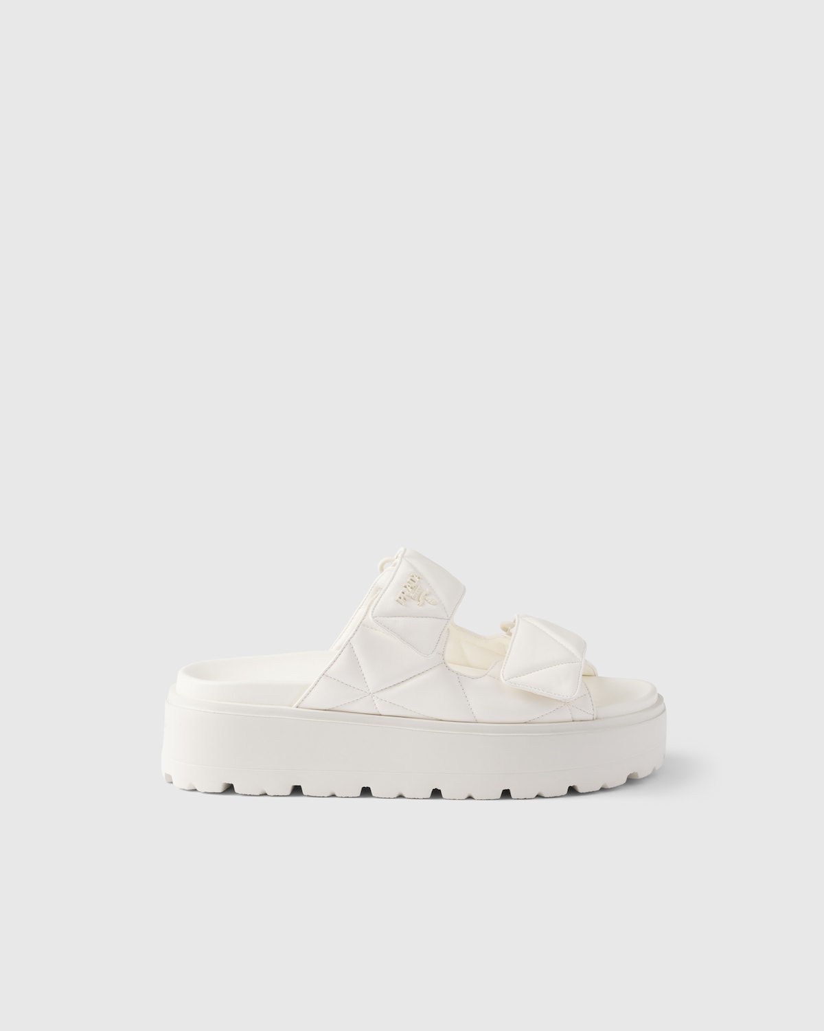 Prada Sandalias planas de napa acolchada